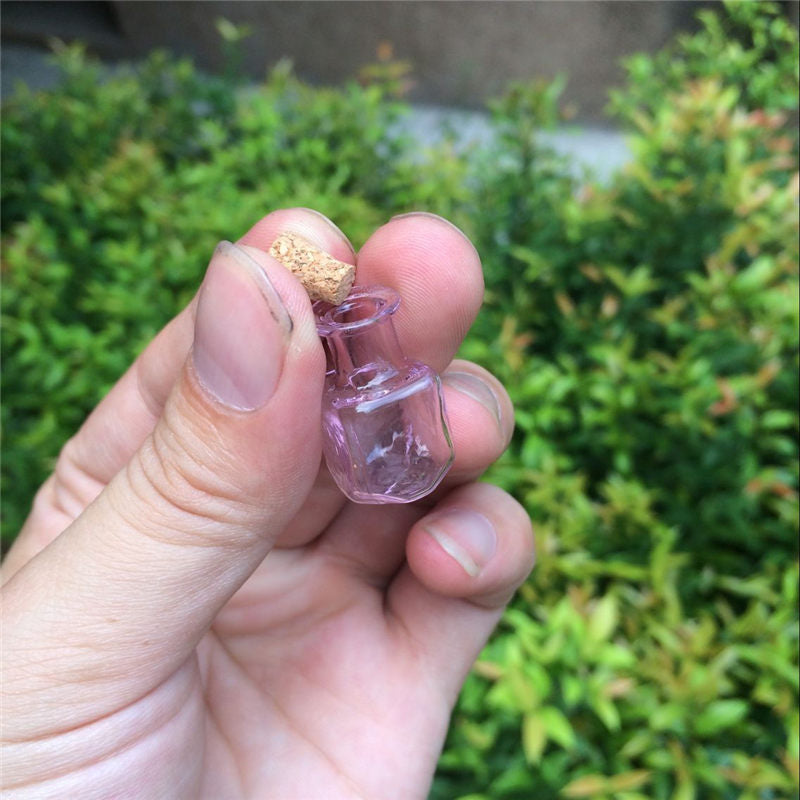 Set of Seven Mini Glass Wishing Bottles With Cork Stoppers