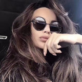Claw Gripped Round Sunglasses Gothic Gold Metal Frame Shades