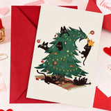 Christmas Card Mischievous Black Cat Climbing Xmas Tree