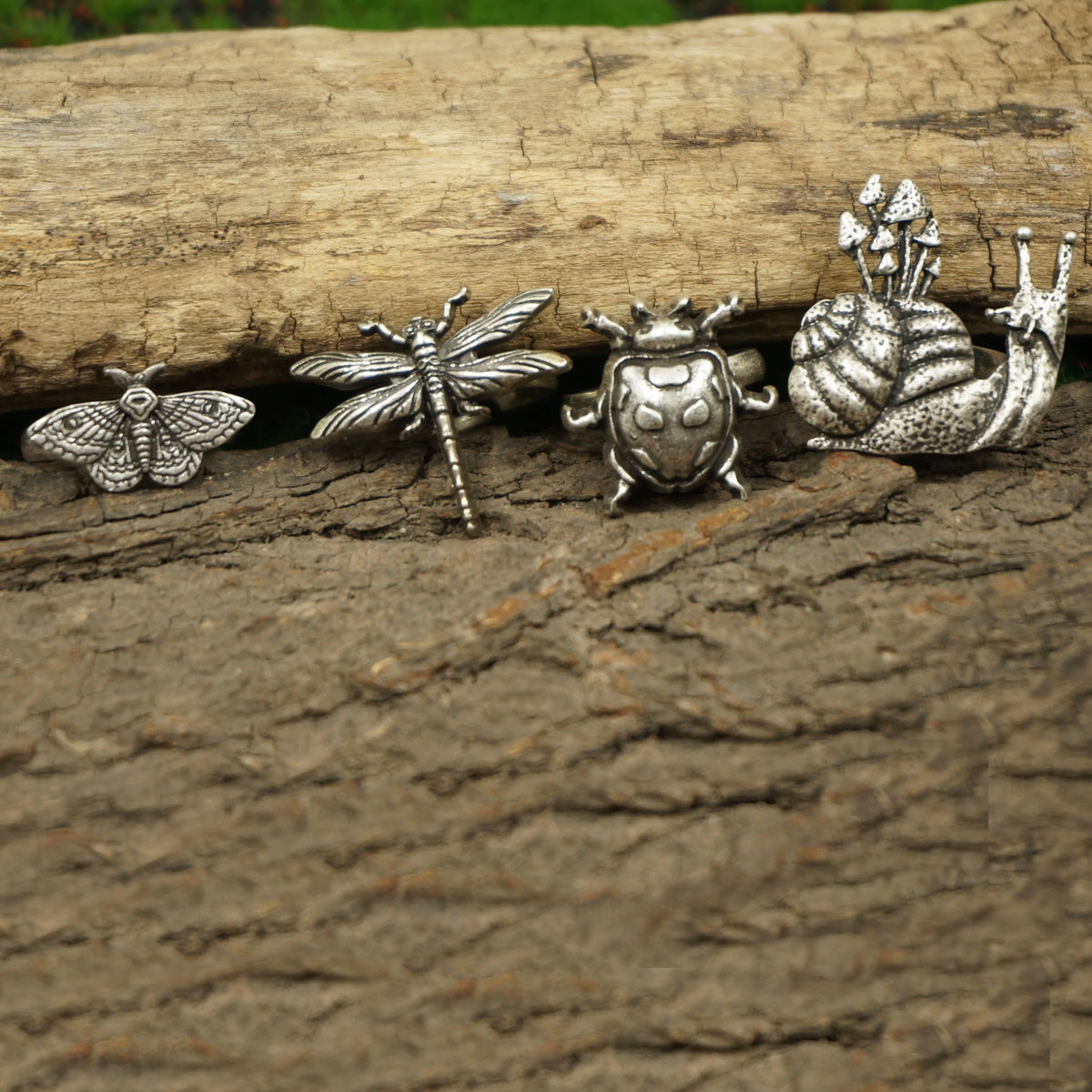 A set of 4 Cute Critter Rings Dragonfly Mushroom Snail Ladybug Moth Rings