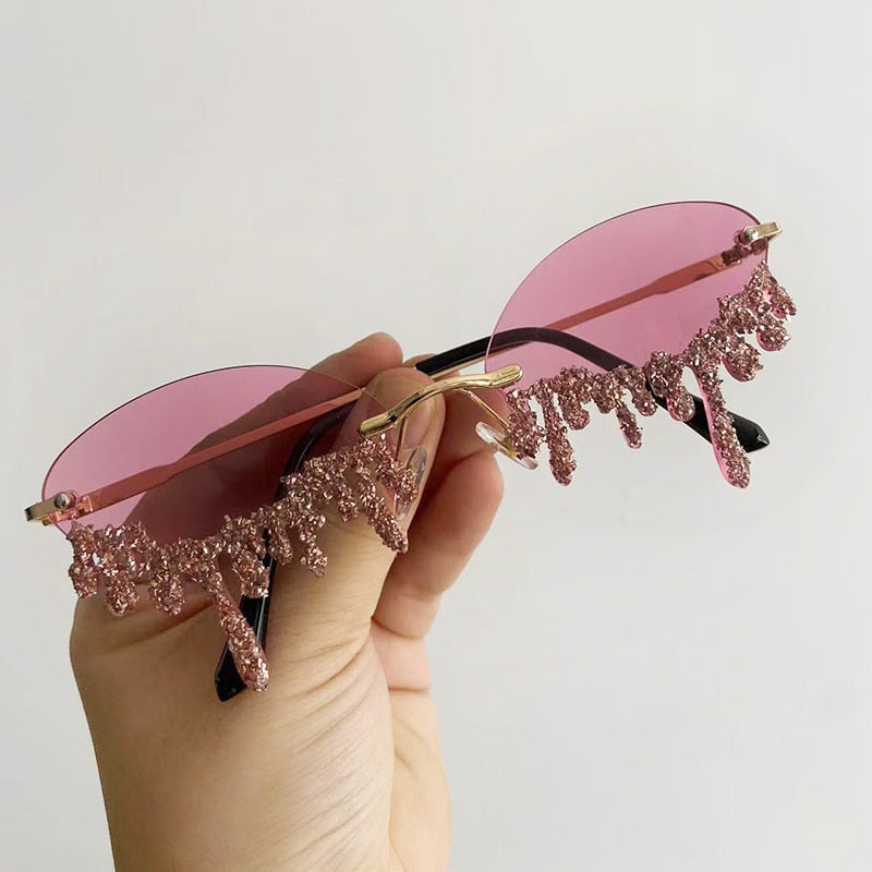 Dripping in Frosting Oval Rimless Rhinestone Sunglasses