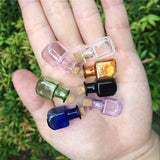 Set of Seven Mini Glass Wishing Bottles With Cork Stoppers