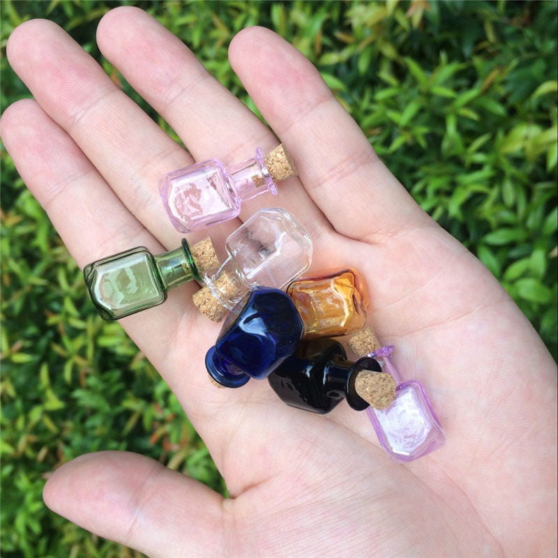 Set of Seven Mini Glass Wishing Bottles With Cork Stoppers